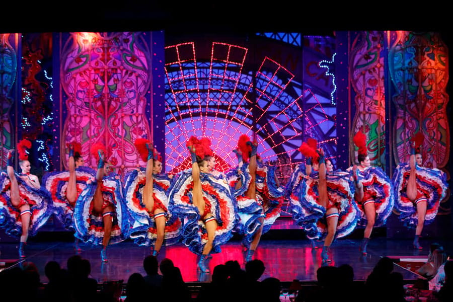 Paris: Evening Sightseeing Tour and Moulin Rouge Show - A Paris night that ends under red windmills