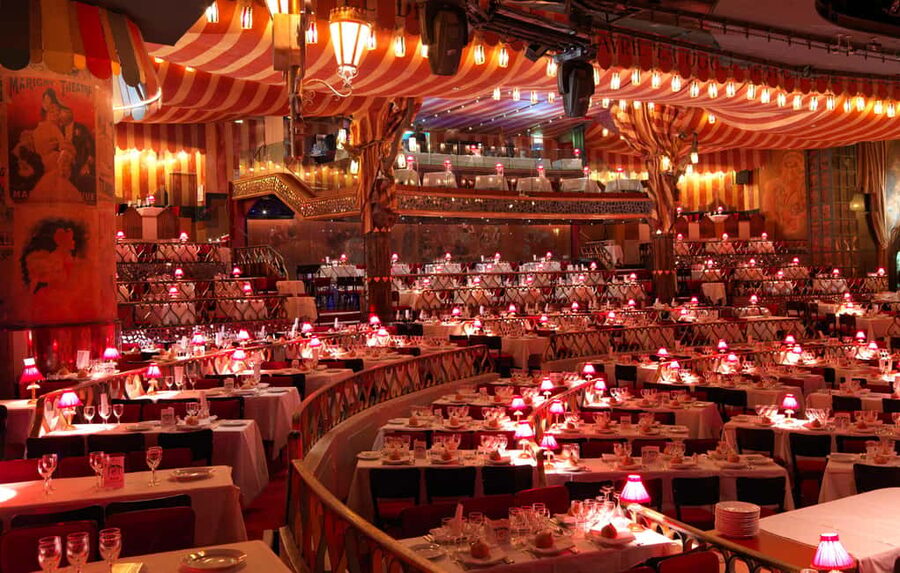 Paris: Moulin Rouge Dinner Show, Champagne, and Transport - A Belle Epoque dinner before the 9pm curtain