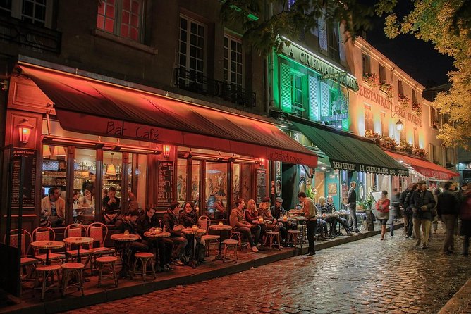 Private Tour: Montmartre Walking Tour, Dinner and Au Lapin Agile Cabaret - Entering Au Lapin Agile for old-style Parisian music
